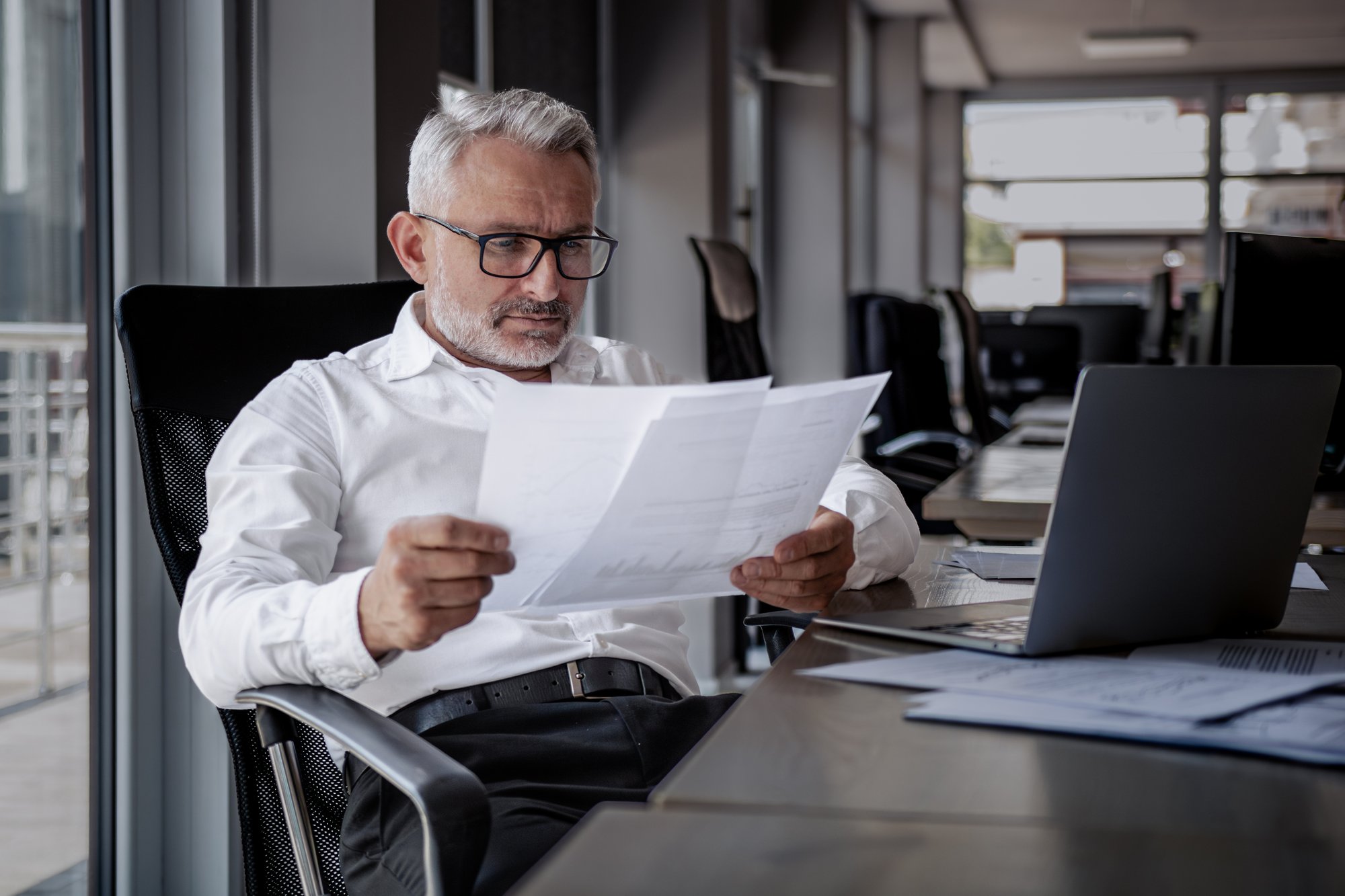 businessman reading guide